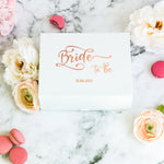 a bride to be box surrounded by flowers