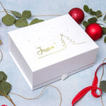 a white box with a christmas tree on it