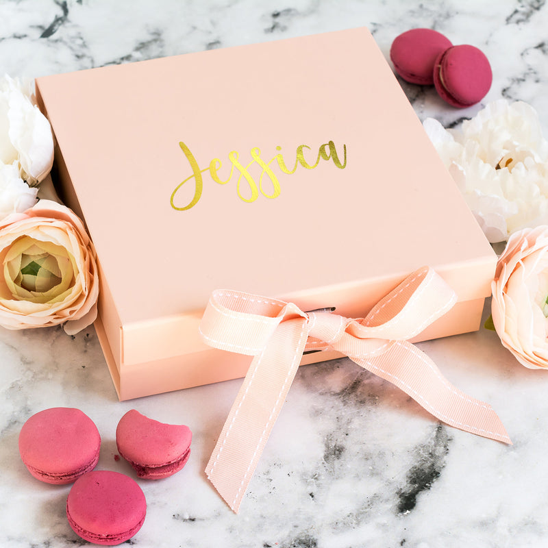 a box of macaroons with a name on it