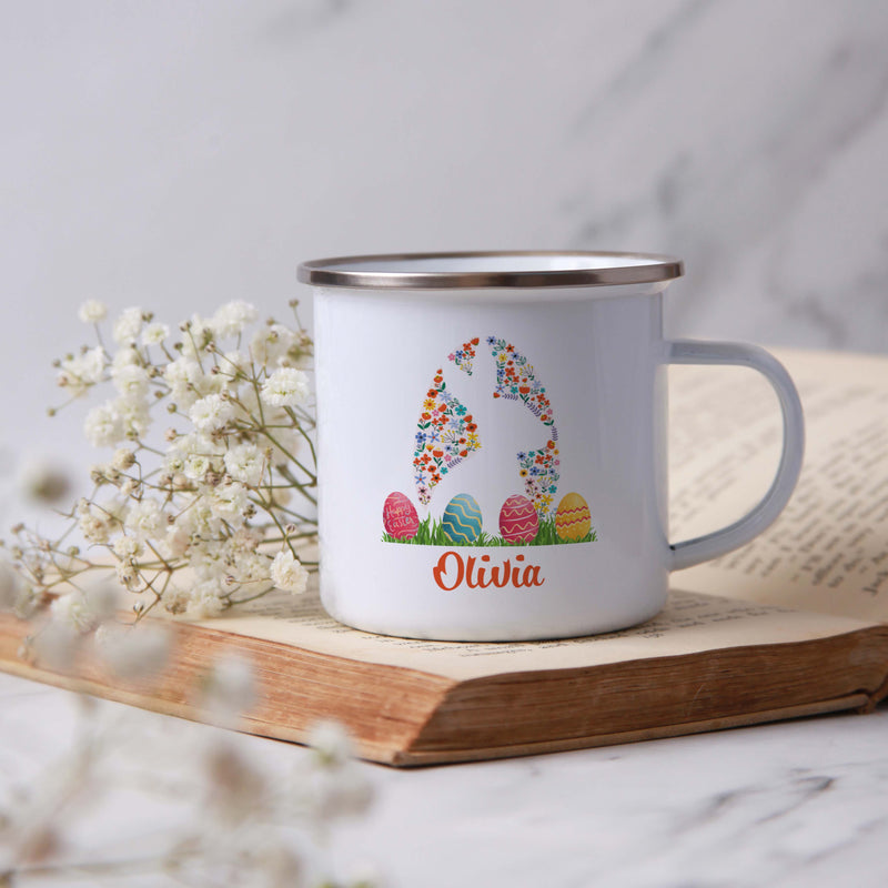 a white coffee mug with a colorful design on it