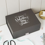 a black box with a happy valentine's day message on it