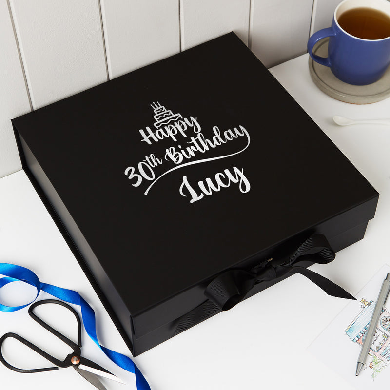 a black box with a happy 30th birthday message on it