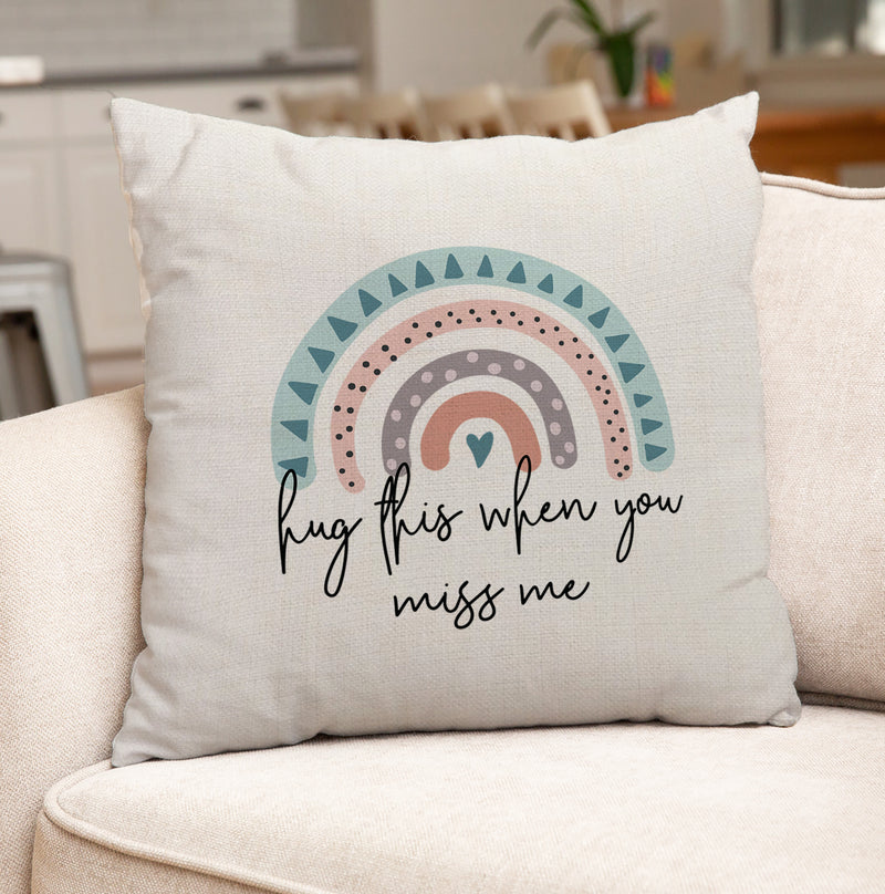 a pillow that says hug this when you miss me